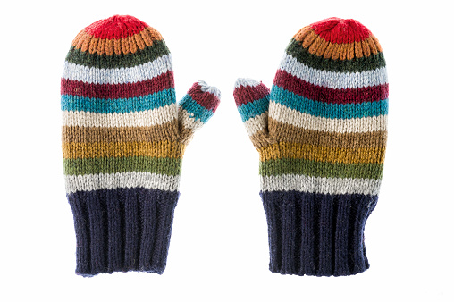 Pair of varicolored striped mittens isolate on white.