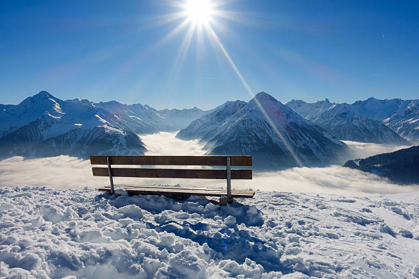 istock Bench with view over the winter Alps 537213683