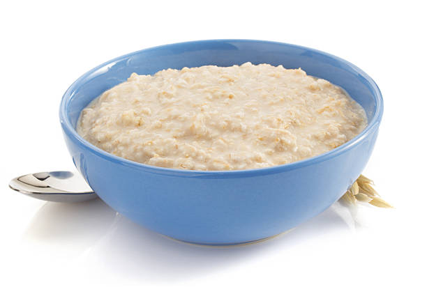 istock bowl of oatmeal  on white 537214709