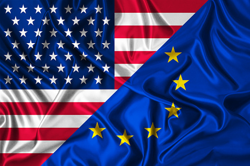 USA vs EU flag on wind  - United States of America vs European Union