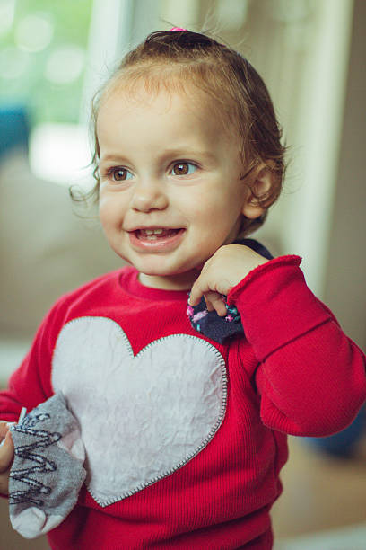 istock Baby girl facial expression 537229122