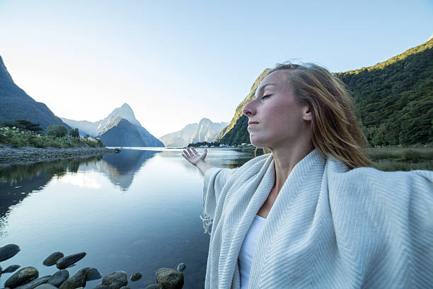istock Young woman relaxing in nature 537229404