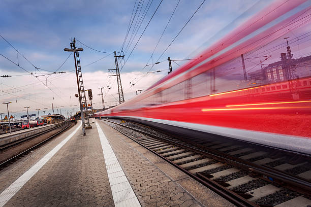 istock High speed passenger train on railroad track in motion 537229666
