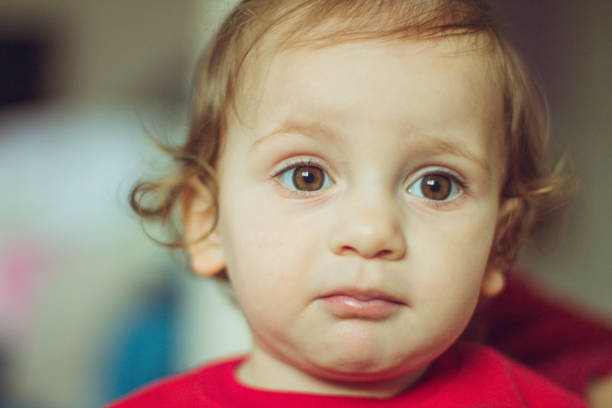 istock Baby girl facial expression 537229688