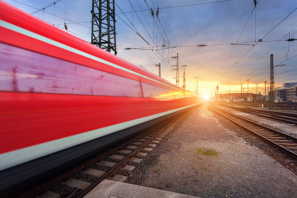 istock High speed passenger train on railroad track in motion 537229704