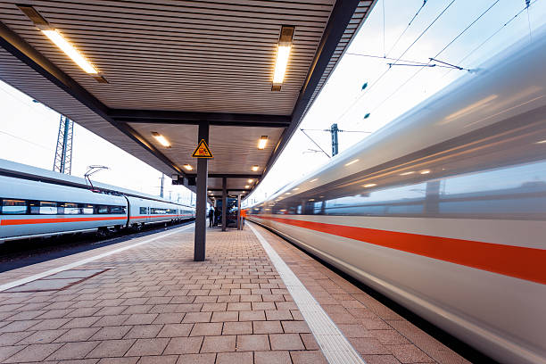 istock High speed passenger train on railroad track in motion 537230204