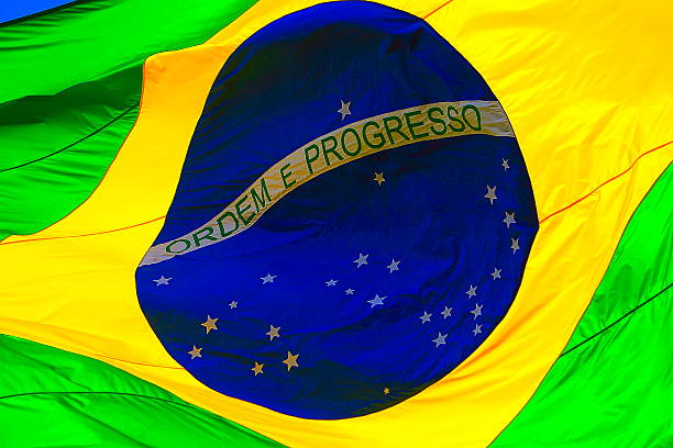 istock Ordem e Progresso: Brazillian Flag waving in the sky 537233606