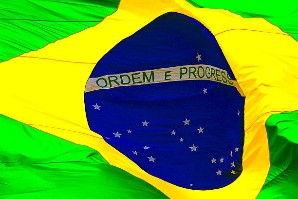 istock Ordem e Progresso: Brazillian Flag waving in the sky 537234016