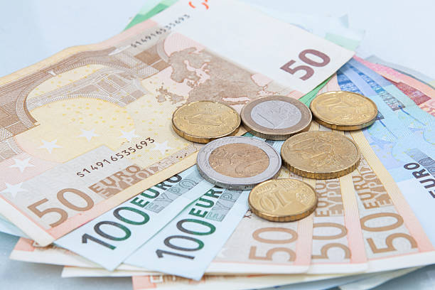 istock Money euro coins and banknotes 537235124
