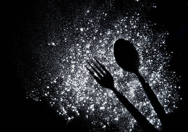 istock Imprint fork and spoon made of flour on a black 537238616