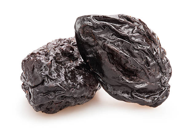 prunes prunes isolated prune stock pictures, royalty-free photos & images