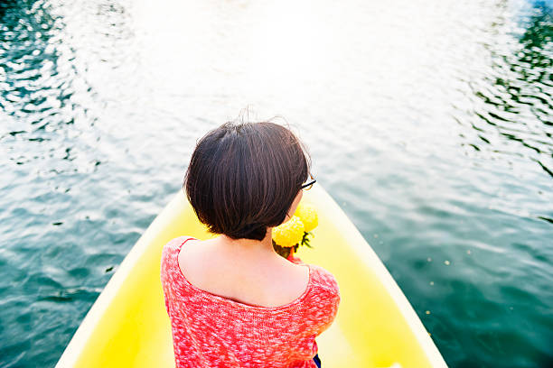 istock Asian Woman Ride On Boat Concept 537245056