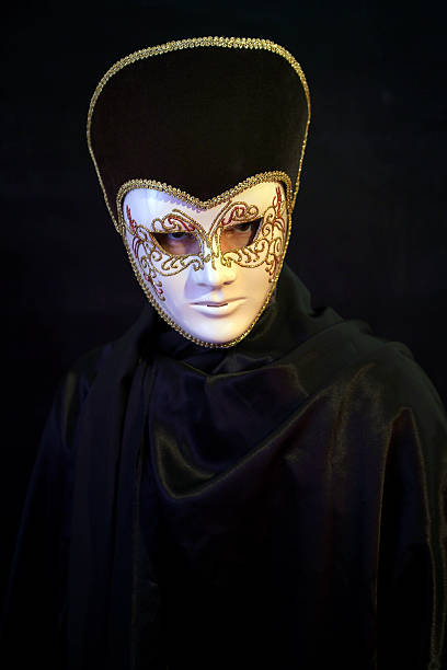 istock man wearing theatre mask 537245125