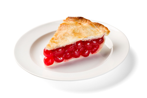 A perfect slice of cherry pie on a white plate on a white background, clipping path is attached.  Please see my portfolio for other food and drink images.