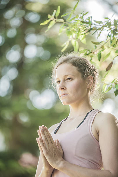 istock Young Woman Practicing Yoga Outdoors 537263120