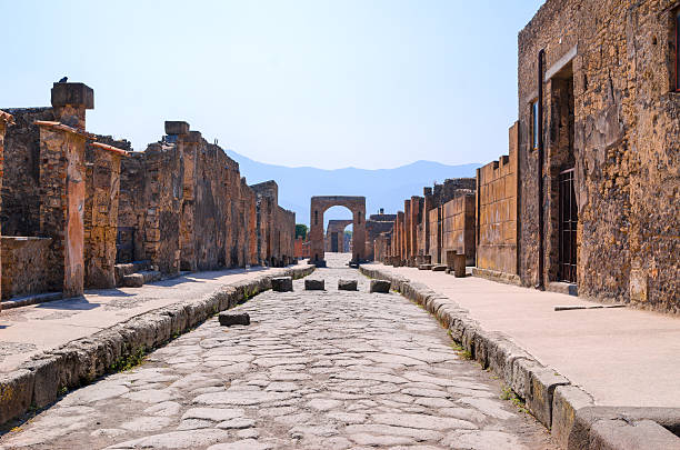 Street in Pompeii View of a lonliness street in Pompei site pompeii ruins stock pictures, royalty-free photos & images