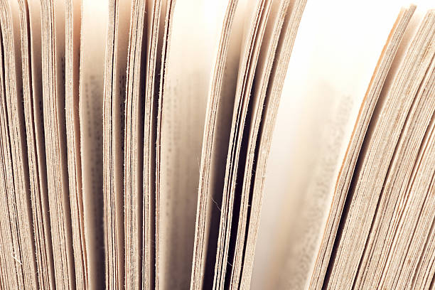 istock old book. seamless texture of book pages. 537268412