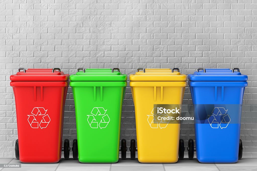 Multicoloured Garbage Trash Bins. 3d Rendering Multicoloured Garbage Trash Bins in front of brick wall. 3d Rendering Recycling Stock Photo