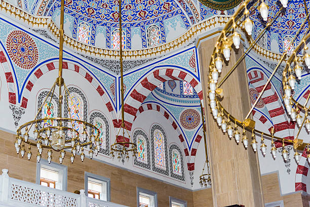 mosque interior detail from vaulted ceil stock photo