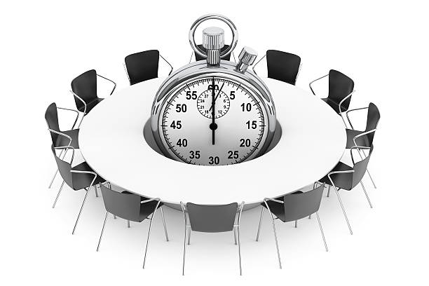 istock Chairs around a Table with Stopwatch in the middle. 537270490