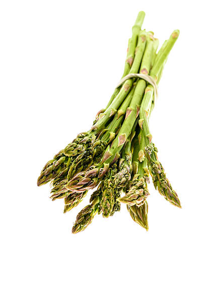 Fresh organic asparagus isolated on white background.