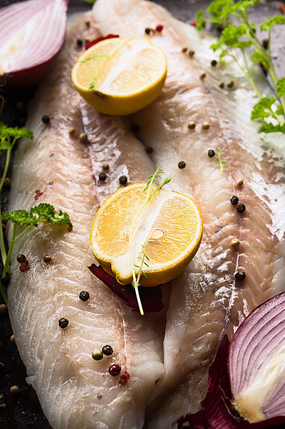 istock Fish fillet  preparation for cooking with lenom,herbs and spices 537271767
