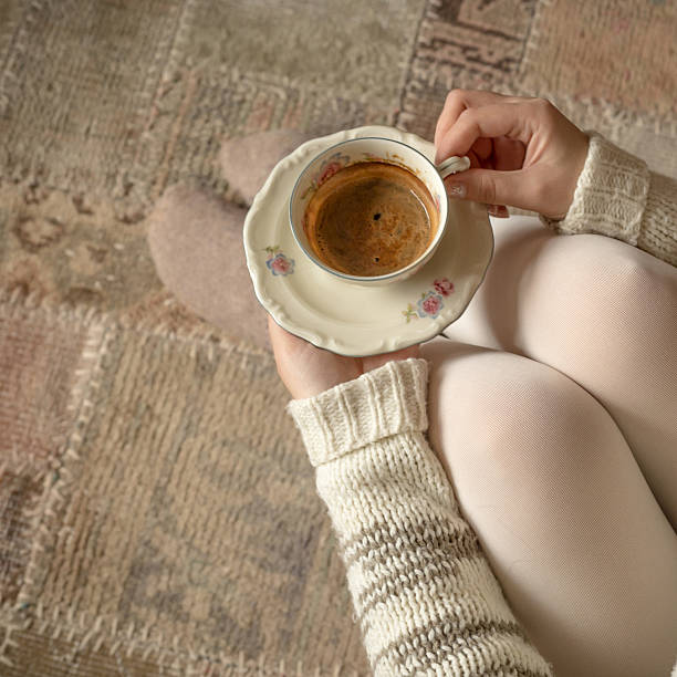 istock Hands holding cup of hot coffee, top view 537273171