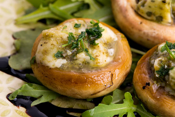 istock Delicious stuffed mushrooms with cheese and pesto 537273211