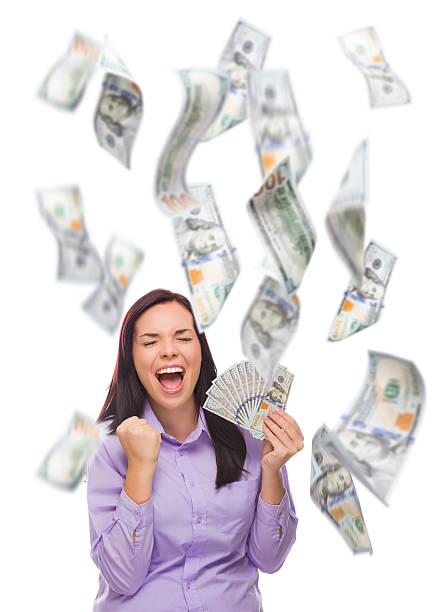 istock Happy Woman Holding the $100 Bills with Many Falling Around 537273671
