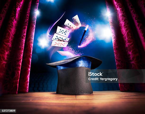 High Contrast Image Of Magician Hat On A Stage Stock Photo - Download Image Now - Magician, Wizard, Hat