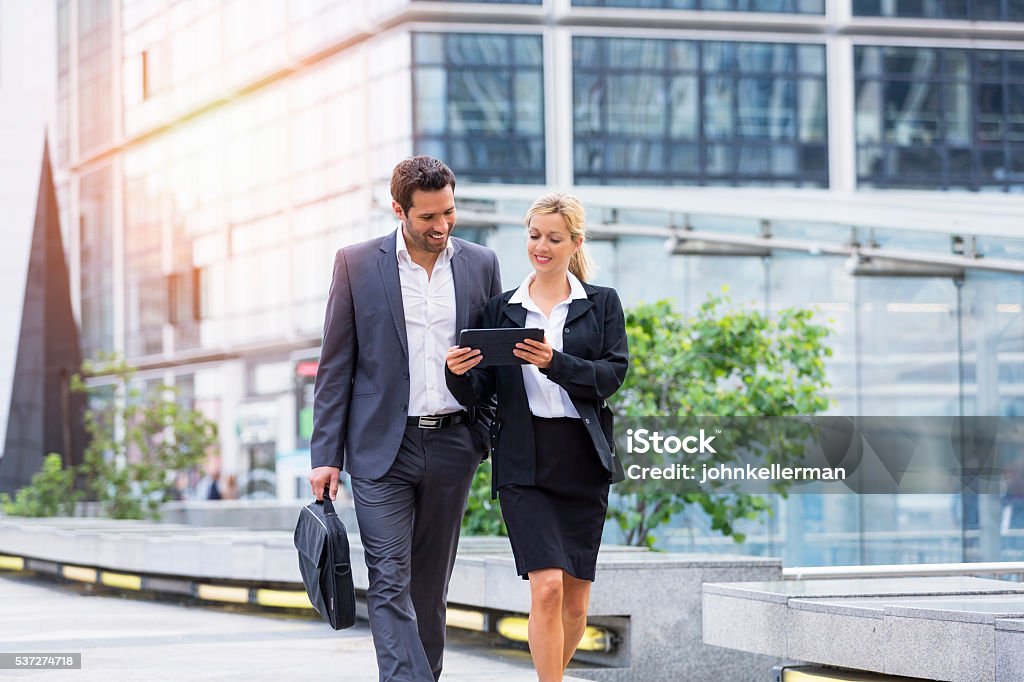 Business people meeting in financial district Outdoors Stock Photo