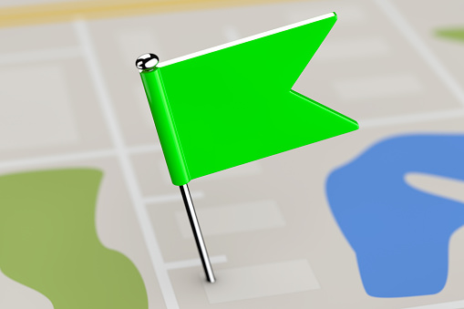 Green Pointer Flag on Map Background extreme closeup. 3d Rendering