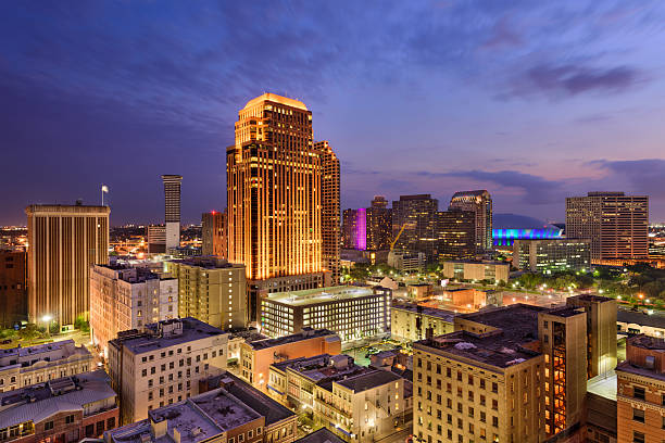 New Orleans Skyline New Orleans, Louisiana, USA CBD skyline at night. new orleans stock pictures, royalty-free photos & images