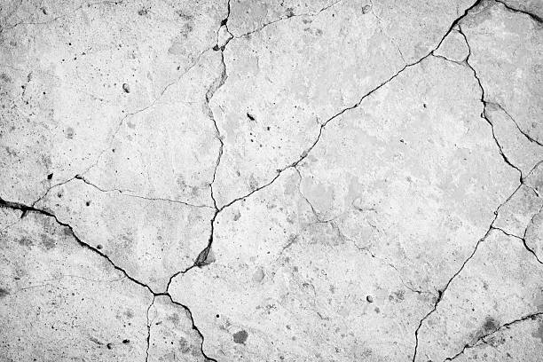Concrete wall Concrete wall background.  cracked stock pictures, royalty-free photos & images
