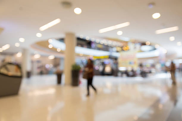 istock people in department store for use as shopping concept, blur 537283484