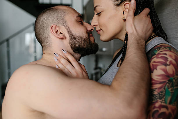 istock man and woman in the kitchen 537285262