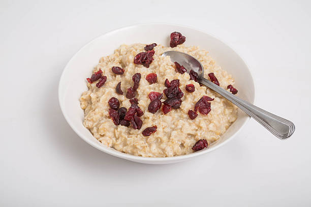 istock Oatmeal with Cranberries and Spoon 537286477
