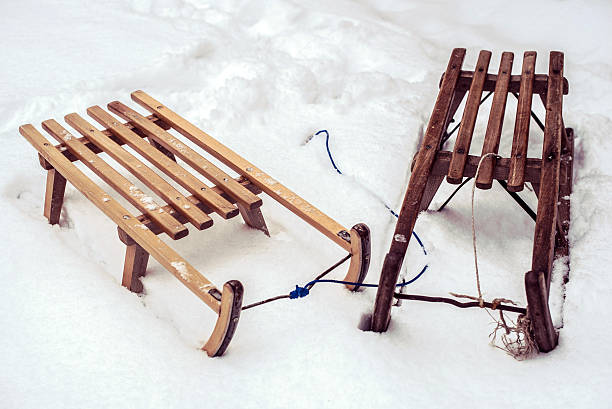 istock two sleighs in the snow 537286701
