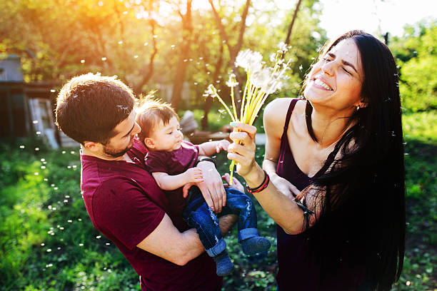 istock young family with a child on the nature 537287106