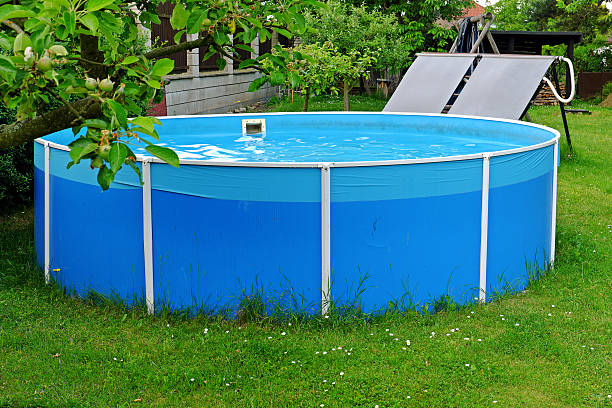 istock Garden pool with black panels 537287812
