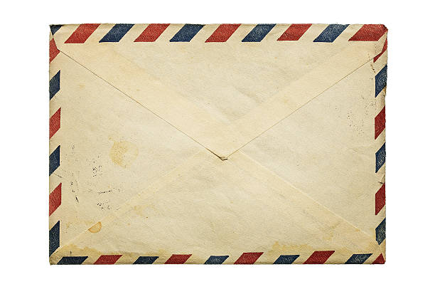 Old envelope Old, vintage envelope isolated on white background with copy space air mail stock pictures, royalty-free photos & images