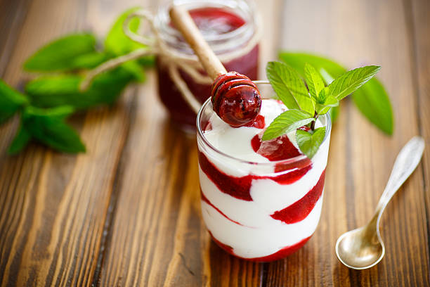 sweet homemade yogurt with fruit jam stock photo