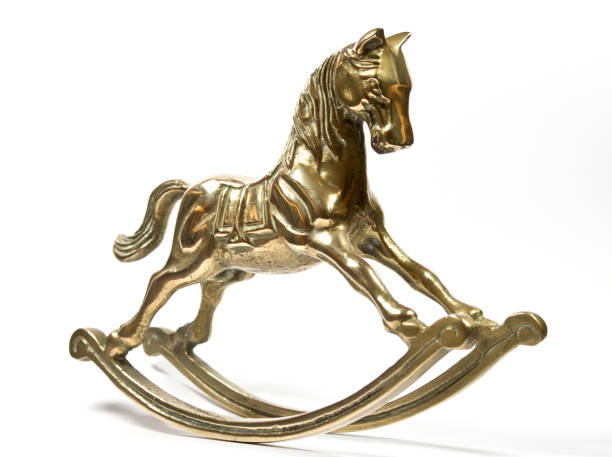 istock Brass Rocking Horse on White Background 537293944