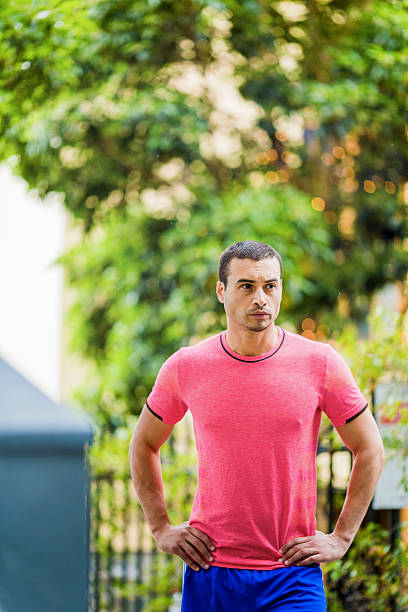 istock Fit man with arms akimbo at park 537294508