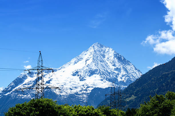 istock Alps landscape with electric poles 537294764