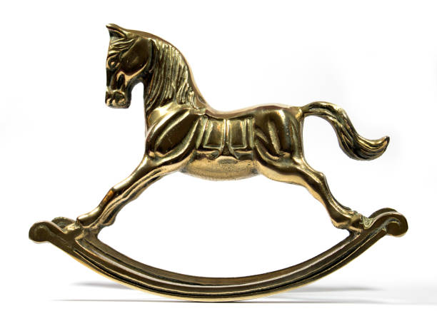 istock Brass Rocking Horse on White Background 537295306