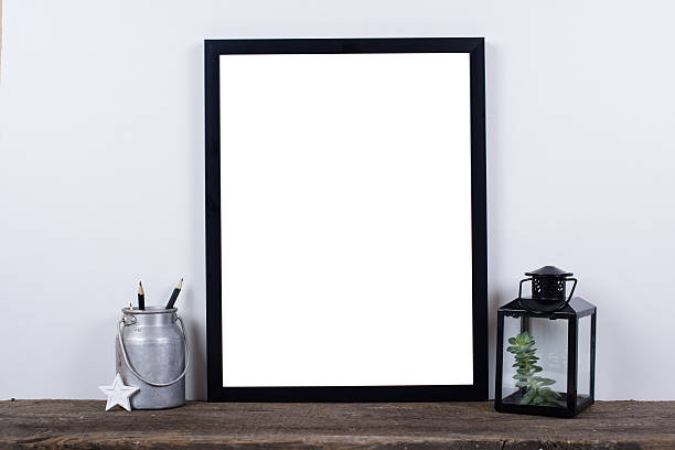 istock Scandinavian style empty photo frame mock up. Minimal home decor 537297544