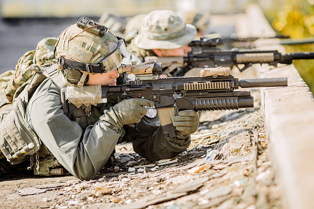 istock group of soldiers lie and shoot 537301719