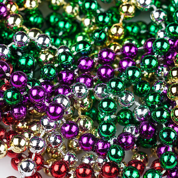istock Mardi Gras beads in traditional colors 537306632