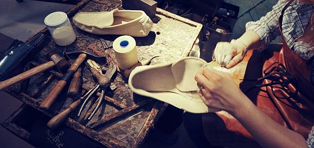 istock craftsman making luxury handmade man shoes 537307402
